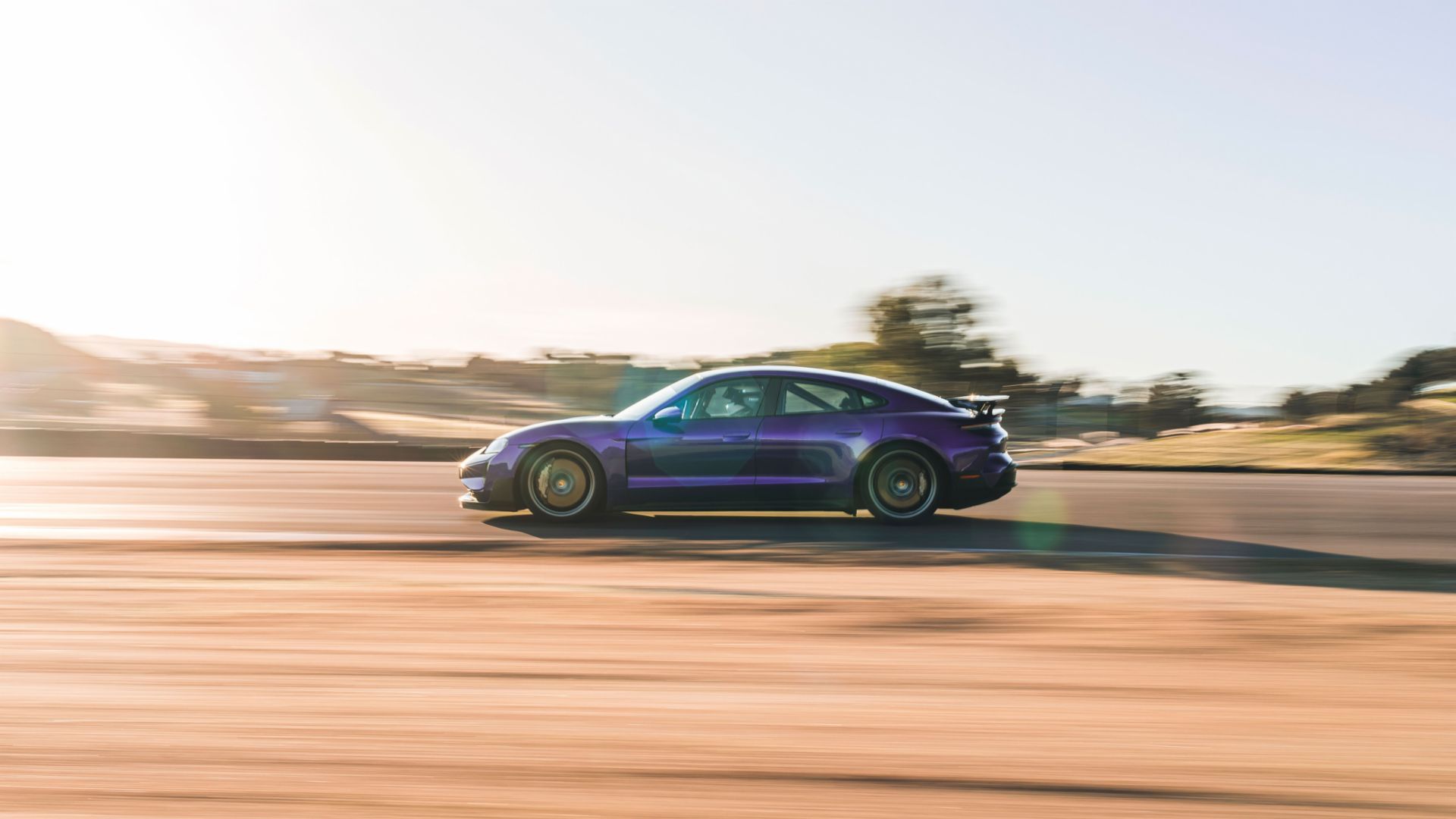 Porsche Taycan Turbo GT purple sky action shot